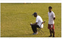 Bashir Hayford sits in the middle of the pitch