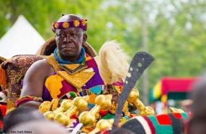 Otumfuo Osei Tutu II being carried in a palanquin