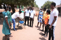 Health worker educating the public