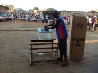 Library Photo: voter casting his vote