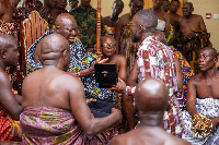 A rep presenting a watch to Otumfuo Osei Tutu II