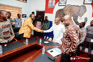 Alan Kyerematen in a handshake with NPP chairman Stephen Ntim