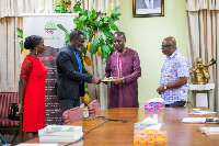 COCOBOD CEO, Joseph Boahen Aidoo getting a copy of the manual