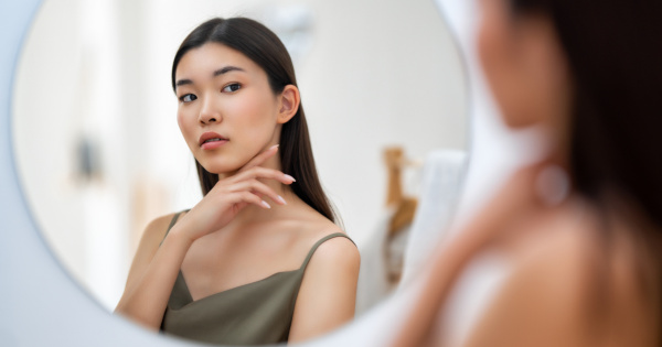 Reflection Of A Women In The Mirror