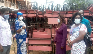 The Sunyani Municipal Director of Education, Theresa Kyere Boakye received the donated desks