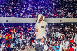 Rapper and Afrobeats star, Maccasio  performs on stage