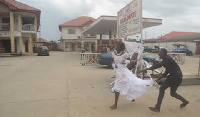 Husband chases bride running away from reception venue