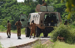 File photo: Burkinabe soldiers patrol near the Presidential Security Regiment military barracks