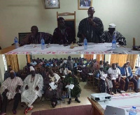 Moses Jotie addressing the House including a shot of some chiefs and participants