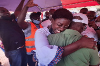 A parliamentary aspirant, Sheila Bartels hugging without a nose mask after her victory