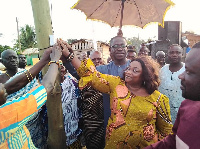 MP for Bosome Freho, Joyce Dei with some residents after the installations