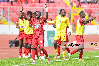 Asante Kotoko players celebrating a goal