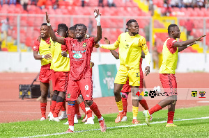 Asante Kotoko players celebrating goal against Hearts of Oak