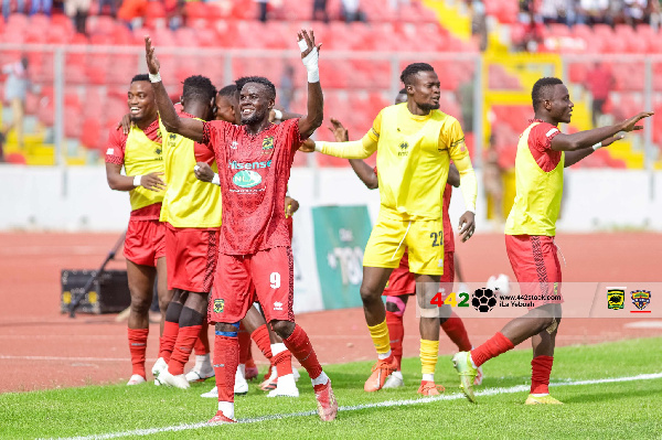 Asante Kotoko players celebrating goal against Hearts of Oak