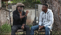 Reggie Rockstone [L] granting Attractive interview