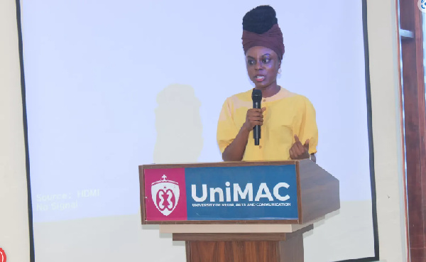 Maxine Danso speaking at the event