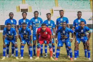 Real Tamale United players line up before a game