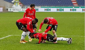 Patrick Twumasi celebrates with his teammates after breaking goal drought