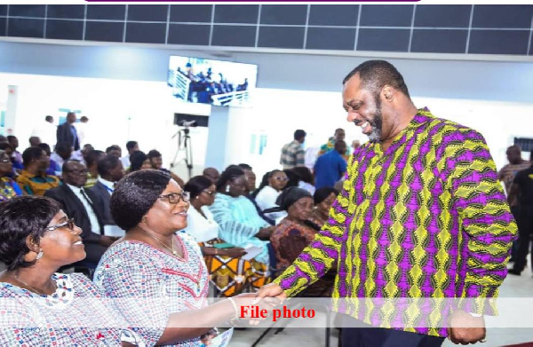 Dr. Matthew Opoku Prempeh in a handshake with GNAT executives.