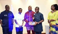 Felix Ofosu Kwakye with some members of the Africa Mobile and ICT Expo (Mobex)