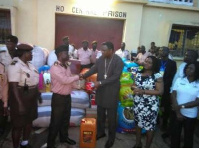 Reverend Sam Korankye Ankrah presenting the items to the Ho prisons