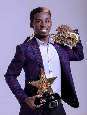 Mizter Okyere exhibiting his plaques