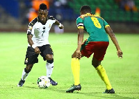 Christian Atsu in action against Cameroon