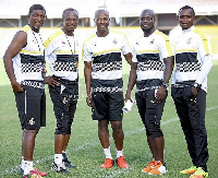 The men in the Black Stars dugout