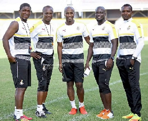 The men in the Black Stars dugout