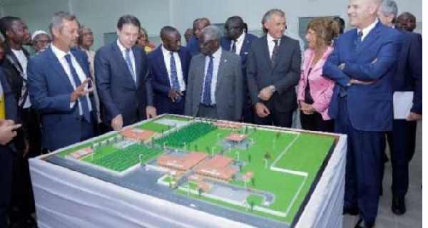 Eni officials and Senior Minister, Yaw Osafo-Marfo (M) in a group photograph