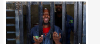 A mine worker at the entrance of the Gold One mine