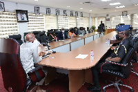 The DG of GPHA, Michael Luguje (left) in an interaction with DCOP Daniel Kwame Afriyie (right)