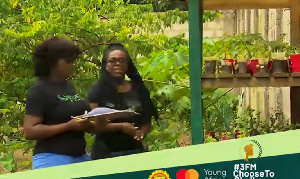 Mercy Sampomaa Boateng working in her farm