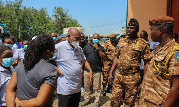 Sam Okudzeto interacting with some of the prisons officials