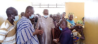 Mustapha Ussif in an interaction with some elders during the commissioning of the project