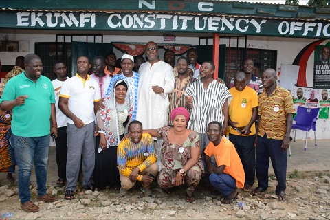 Kojo Bonsu in a photo with some of the delegates