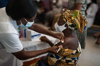 File photo of a woman receiving vaccination