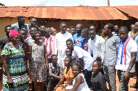 Group photo of beneficiaries with the minister