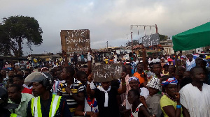 Some supporters of Nii Lantey Bannerman carrying placards