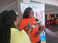 Mrs Mills Odoi speaking to the media