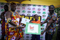 Nana Kwame Kusi II presenting award