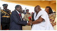 President Mugabe exchanging pleasantries with President Akufo-Addo