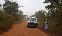 Many Ugandans rely on minibuses, like this one, to get to work