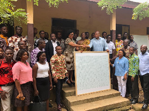 Samuel Okudzeto Ablakwa making the presentation of graph boards to the schools