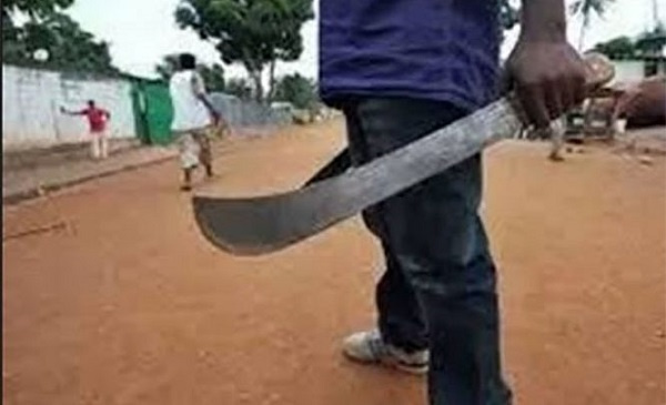 File photo of a man wielding a cutlass