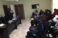 (ACP) Andrews Boadu Ekumah, Deputy Ahafo Regional Police Commander speaking to some police officials