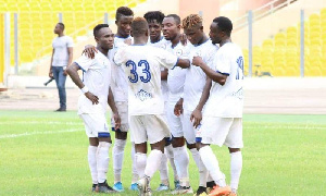 Accra Great Olympics players prepare for a league game