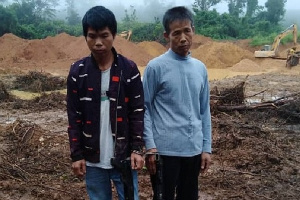 The two Chinese nationals arrested in the raid