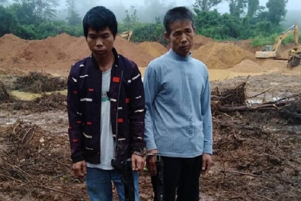 The two Chinese nationals arrested in the raid