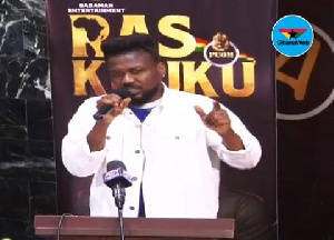 Samini speaking at the signing session of Ras Kuuku